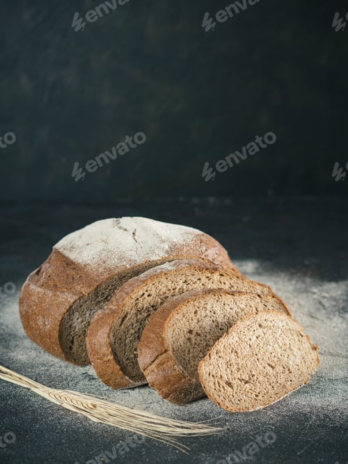 Preview: Sliced homemade sourdough rye bread, copy space