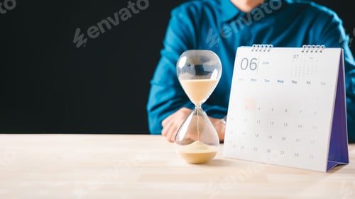 Preview: Time running hourglass glass shows countdown for job hunting deadline, calendar marking key dates,