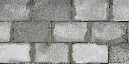 Preview: Brick block wall under construction.
