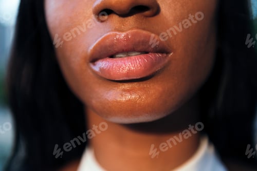 Preview: full-lipped mouth of a young african woman