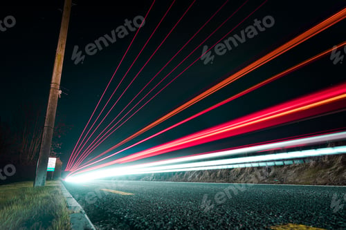 Preview: Low angle of traffic lights at night shot in long exposure