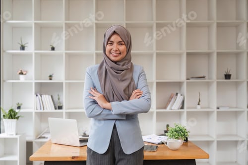 Preview: Business Woman Muslim Woman. Portrait Of Confident Arabic Businesswoman In Hijab Standing Workplace