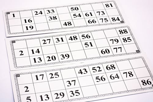 Preview: board game lotto, cards with numbers for the game, kegs are on the cards during the game,