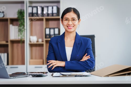 Preview: Asian businesswoman specializing in stock market financial services, including roles loan officer