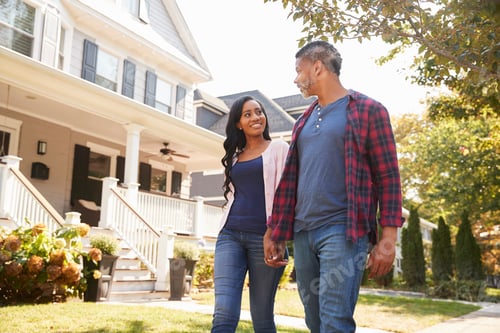 Preview: Couple Walking Along Suburban Street Holding Hands