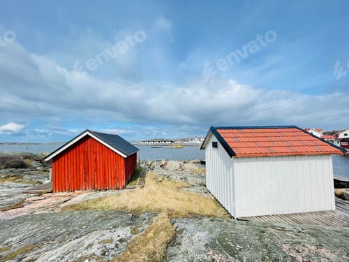 Preview: A view of red wooden houses on Vrango Archipelago island .