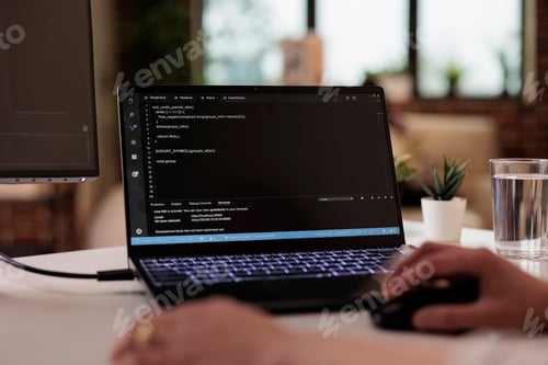 Preview: Asian web developer using terminal window