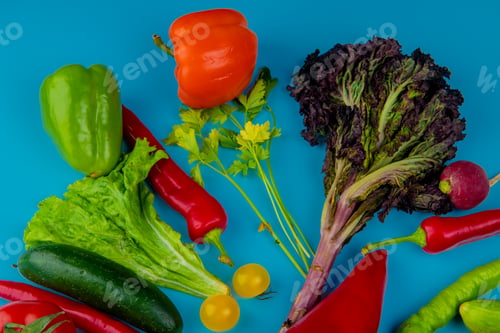 Preview: top view of fresh vegetables as colorful bell peppers chili peppers tomatoes cucumbers