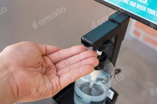 Preview: Alcohol gel on palm from touchless machine to inhibit the spread of infection