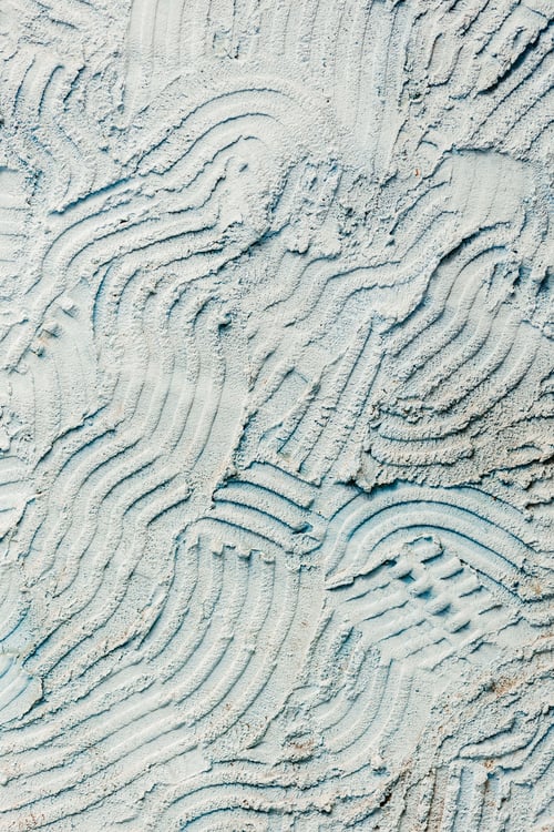 Preview: Closeup of pastel blue wall with abstract concrete textures, perfect for wallpapers