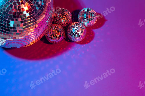 Preview: Mirror party balls put on table close up