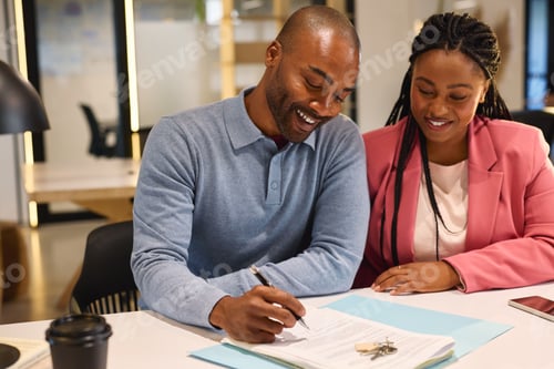 Preview: Black couple signing a legal real estate contract