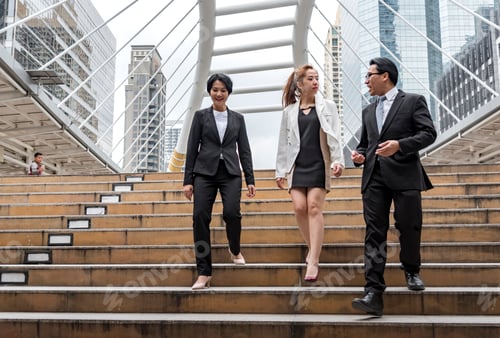 Preview: Team leadership business people walking together city life. Group of business team leader power