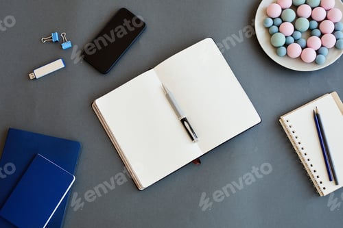 Office Desk Still Life with Notebook and Pen