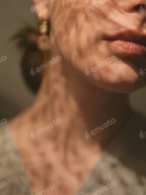 Preview: Close up Portrait of Woman with Shadowed Face
