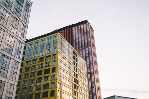Preview: High rise buildings under cloudless blue sky