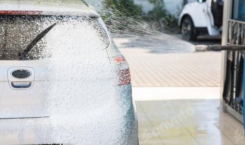 Preview: Car cleaning with foam shampoo at a car wash