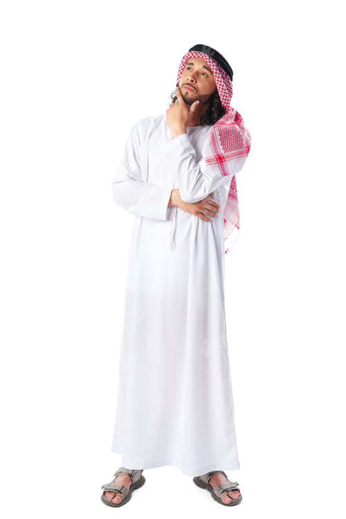Preview: Pensive young man in traditional middle-east dress thobe on white background