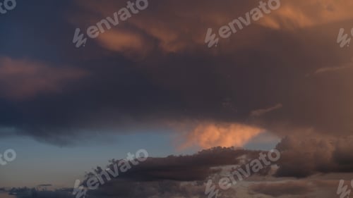 Preview: Dramatic sky. Fragment of a house against the backdrop of a sunset or sunrise, a purple sky