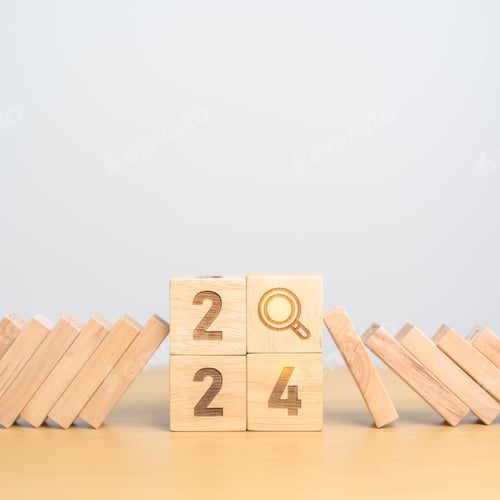 Preview: 2024 year and falling blocks with magnifying glass icon.