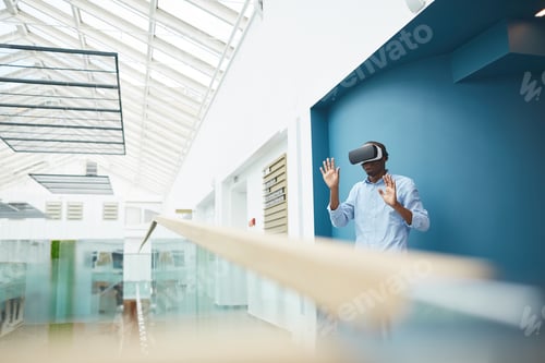Preview: Businessman talking to colleague virtually