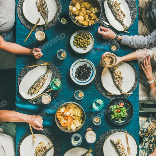 Preview: Flat-lay of people eating fish and drinking beer, square crop