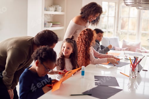 Preview: Group Of Children At Home With Parents Having Fun Making Craft Together