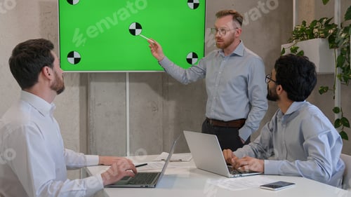 Preview: Office conference meeting male chief talking to diverse men team professional businessmen business