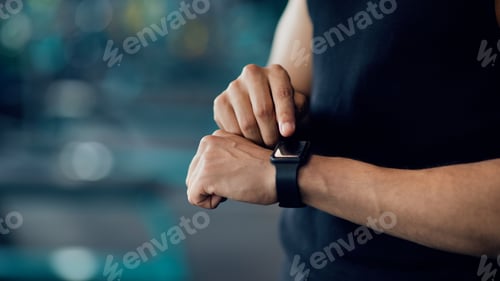 Preview: Sport Gadgets Concept. Unrecognizable Male Athlete Checking His Fitness Activity On Smartwatch
