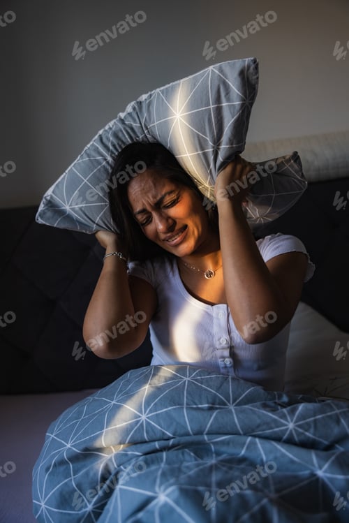 Preview: Frustrated Woman Blocking Noise