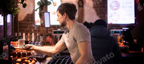 Preview: attractive male choose food in street cafe b