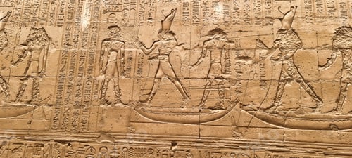 Preview: Ancient Egyptian artwork adorns an old building, showcasing captivating symbols and figures
