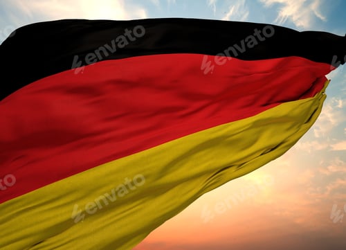 Preview: Closeup view of the waving German flag on a background of sunset