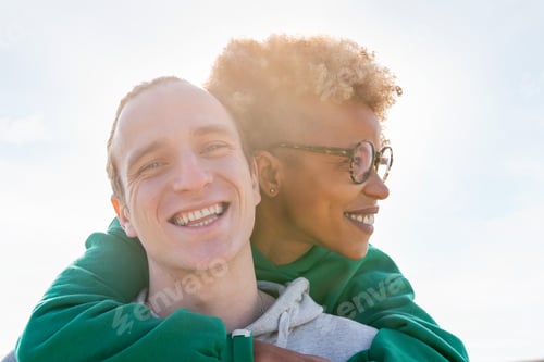 Preview: young couple of latin woman and caucasian man