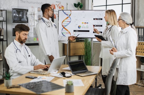 Preview: Workers discussing gene modification at clinic meeting room