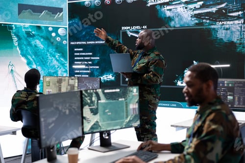 Preview: Group of soldiers in a secure office environment collaborates on intelligence analysis