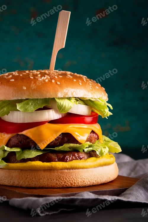 Preview: Styled double burger with cheese, beef, green lettuce and onions