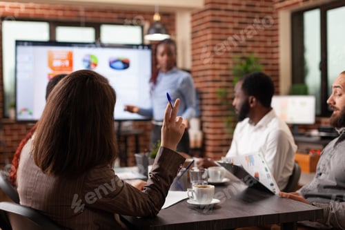 Preview: African american executive manager standing in front of monitor