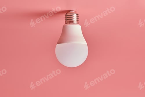 Preview: Light bulb, copy space. Energy saving minimal idea concept.Pink background.