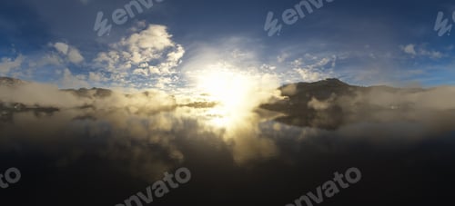 Preview: Dramatic Aerial Panorama of Clouds and Mountain Landscape. Nature Background.
