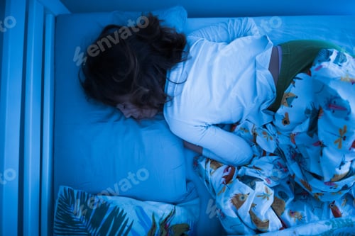 Preview: Small 11 Year Old Girl Sleeping In Bed On A Stomach.