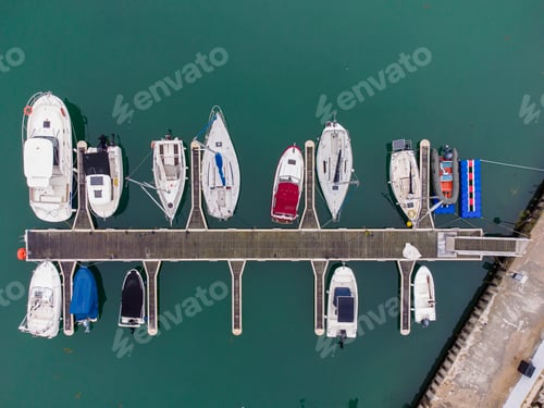 Preview: Aerial view of a lot of yachts and boats moored in marina.