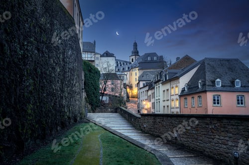 Preview: Luxembourg city street at night with St Michaels Church on background - Luxembourg City, Luxembourg