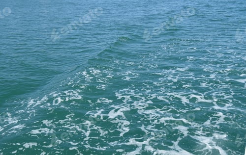 Preview: Background with wave and foam, trace on the surface of the water behind the fast moving ship