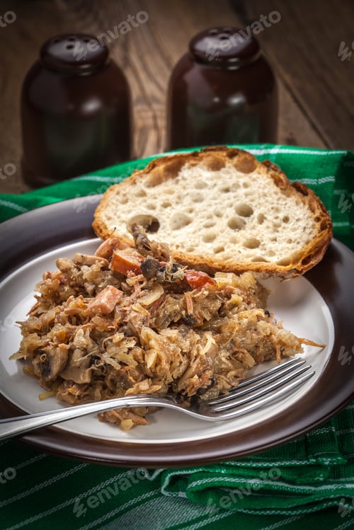 Preview: Traditional polish sauerkraut (bigos) with mushrooms and meat.