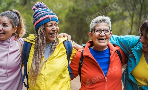 Preview: Multiracial women having fun during trekking day into the wood - Escape to the nature and travel