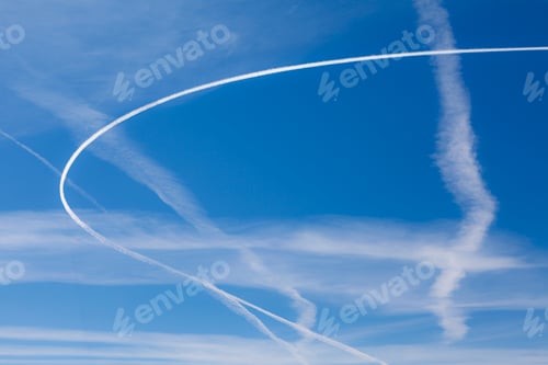Preview: Jet trail across blue sky