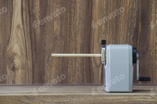 Preview: stapler placed on wooden table with copy space for vintage style wood grain background design