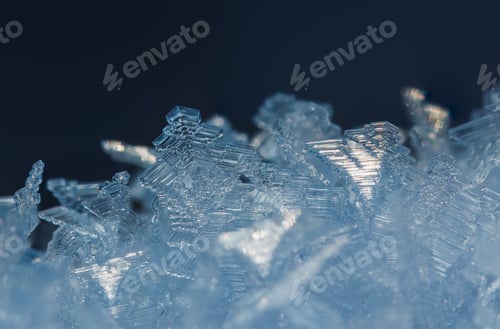 Preview: Winter background of ice crystals, icy background