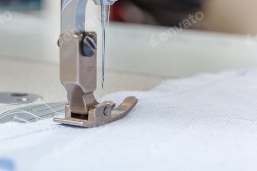 Preview: Sewing machine needle with thread and fabric